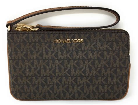 michael kors clutch handbag|Michael Kors wristlet on sale.